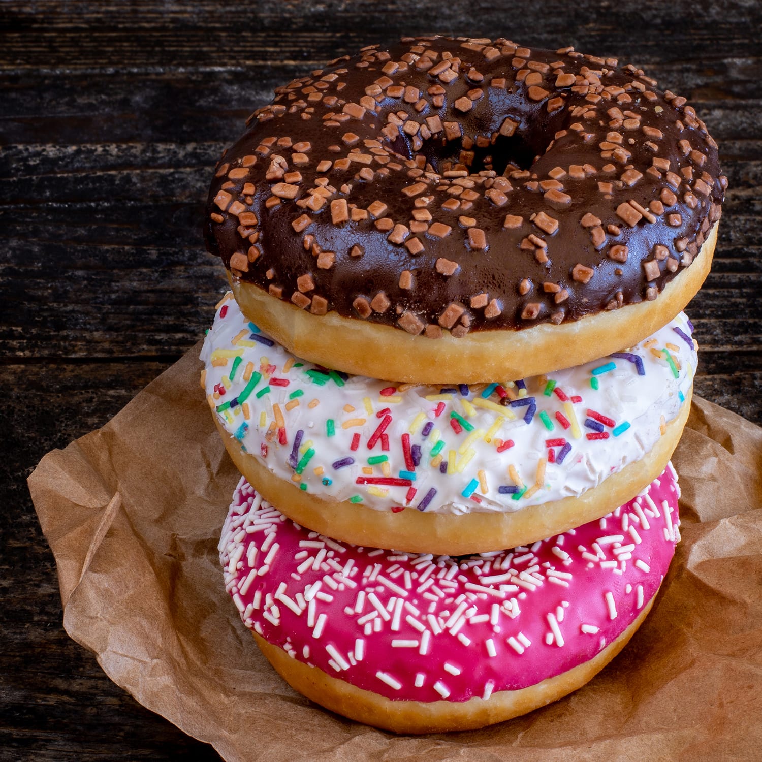 Many,Colorful,Donuts,On,The,Table.,Assorted,Types,Of,Doughnuts.